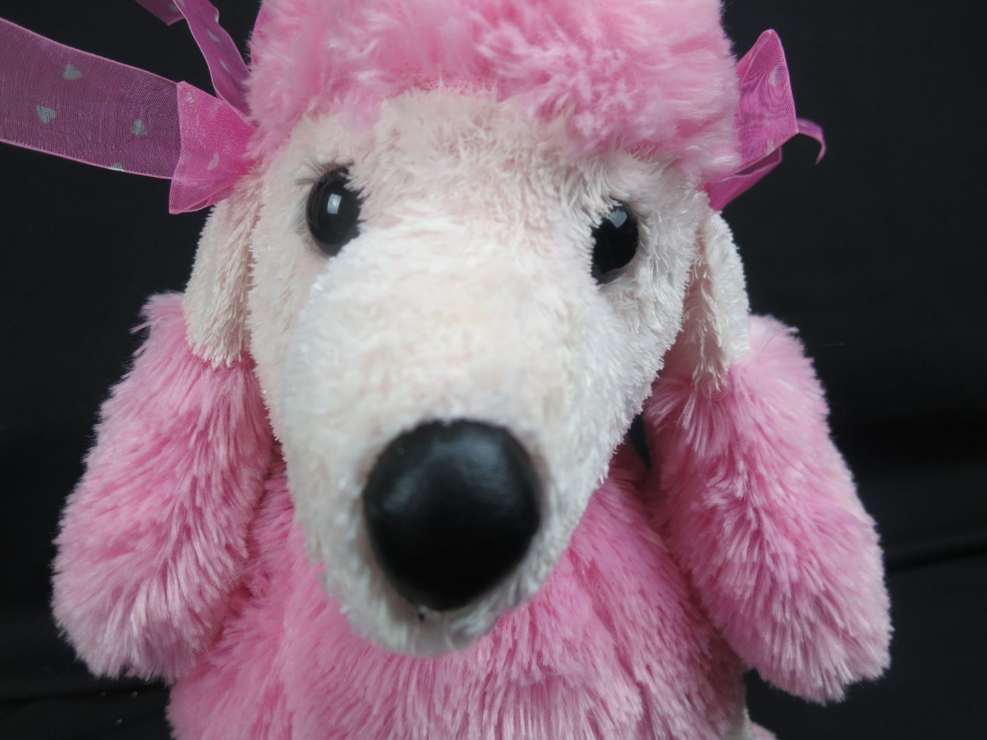 large pink poodle stuffed animal